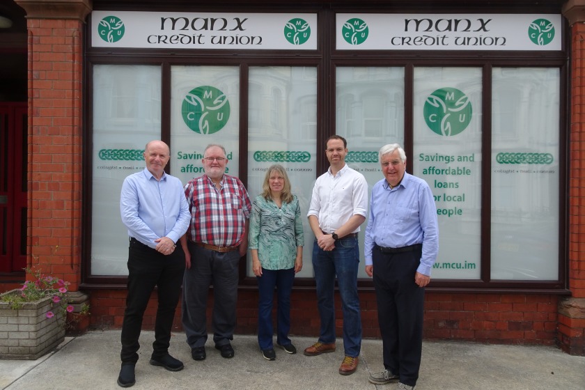 Manx Credit Union volunteers with Santander's James Geldert (second from right)